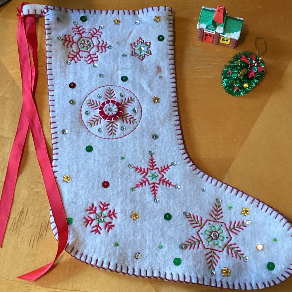 Festive Embroidered Holiday Stocking with Red Accents